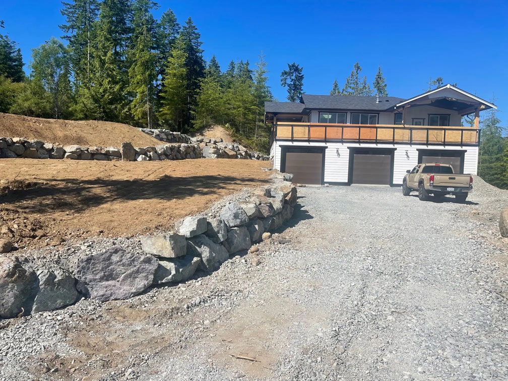 Built Carriage House – Rock Retaining Wall